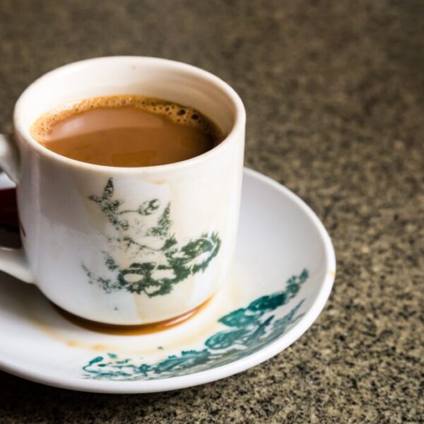 Traditional oriental Chinese coffee in vintage mug and saucer