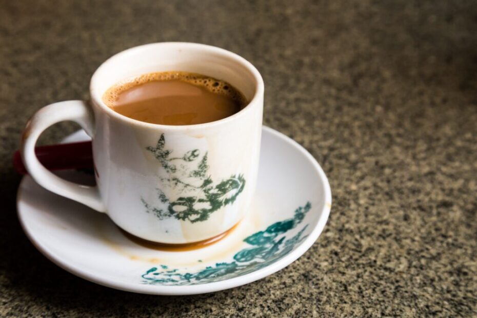 Traditional oriental Chinese coffee in vintage mug and saucer